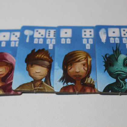 Cardboard tiles with images of various adventurer characters. "view"
